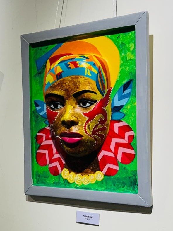 Relief portrait with vibrant geometric motifs