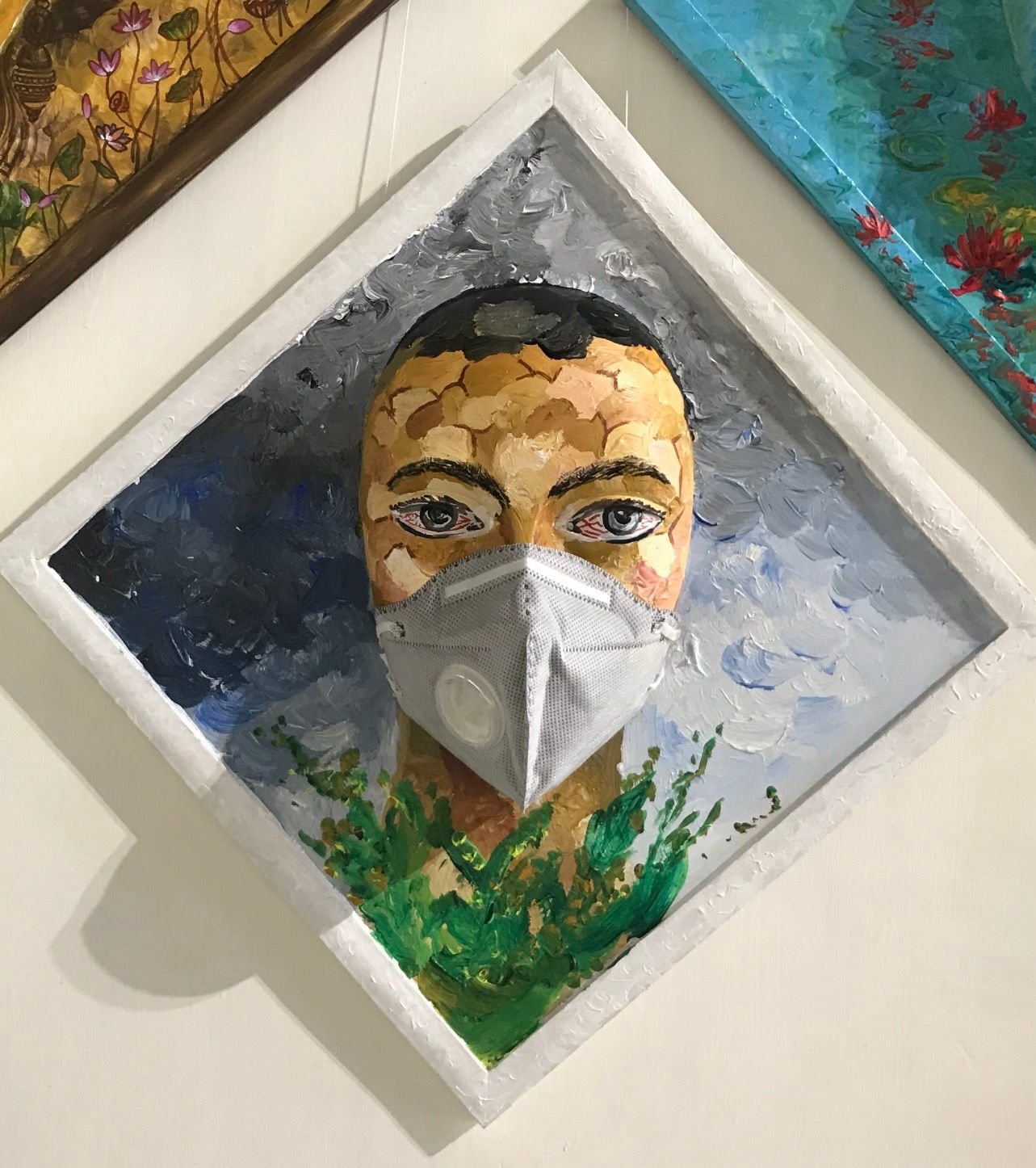 Relief portrait with vibrant geometric motifs