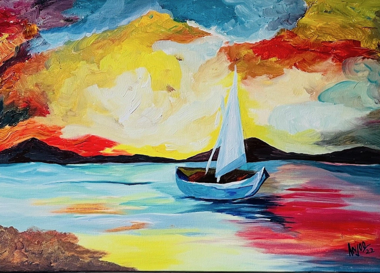 Vivid sunset with a white sailboat